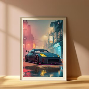 May include: A framed wall art print featuring a dark grey sports car parked on a wet city street at night. The car has yellow headlights and a rear spoiler. The background shows urban buildings with glowing neon signs in pink and blue hues.