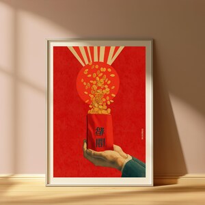 May include: A framed poster featuring a vibrant red background with a large orange circle at the top. Gold coins cascade from the circle into a red envelope held by a hand. The envelope displays the black Chinese characters 彿閣.