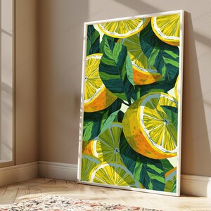 May include: A vertical rectangular framed wall art print featuring a vibrant illustration of sliced yellow lemons and deep green leaves. The composition displays multiple citrus segments overlapping with foliage in a dense, colorful pattern.