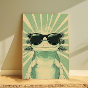 Puede incluir: Una impresi&oacute;n de arte mural rectangular que presenta una ilustraci&oacute;n estilizada de un ajolote con gafas de sol negras. El ajolote est&aacute; centrado sobre un fondo verde claro con l&iacute;neas de rayos de sol blancas. La criatura tiene la cara moteada.