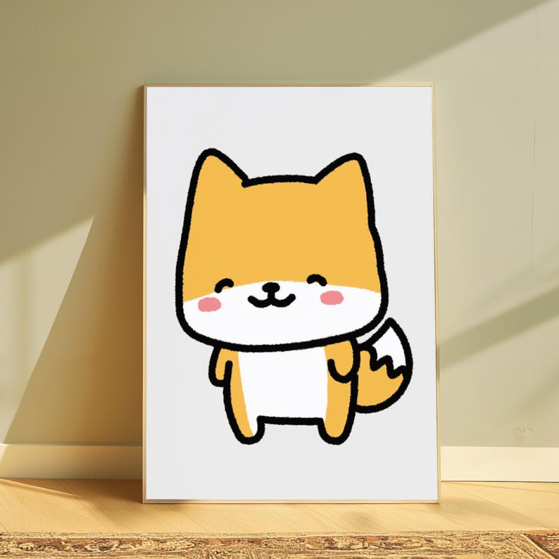 May include: A framed wall art print featuring a stylized cartoon illustration of a yellow and white fox with a thick black outline. The fox has a smiling expression, small black eyes, a black nose, and pink circular cheeks on a white background.