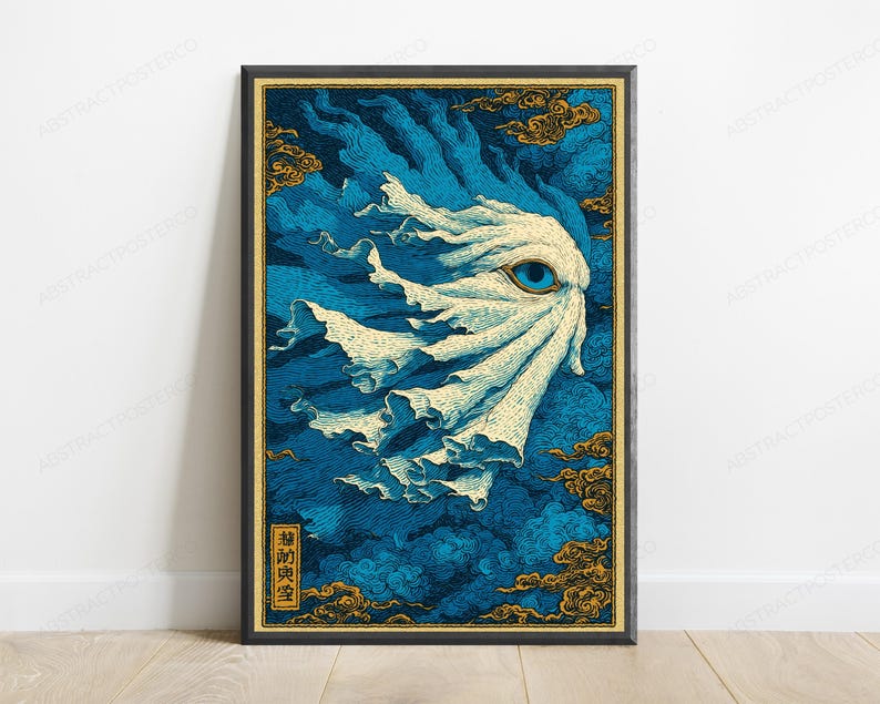 May include: A rectangular wall art print featuring a stylized white, flowing, ghost-like figure with a single prominent blue eye, set against a deep blue background with gold-colored clouds and a small vertical rectangular box containing black text.