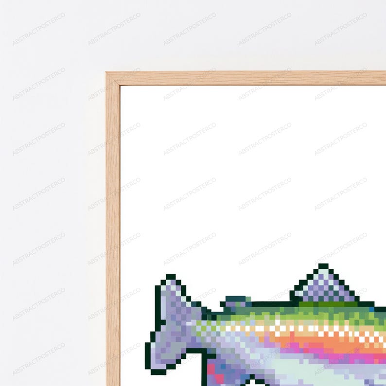 May include: A framed wall art print featuring a pixel art illustration of a fish. The fish is rendered in a vibrant gradient of colors including purple, green, orange, and white, set against a plain white background within a light wood frame.