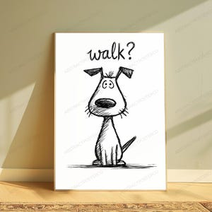 May include: A rectangular wall art print featuring a black and white sketch of a dog with large eyes and a prominent nose. Above the dog, the word walk? is written in a handwritten script. The drawing style uses loose, expressive black lines.