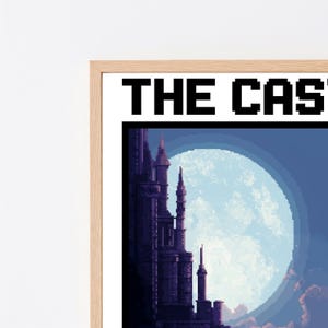 Puede incluir: Una impresi&oacute;n de arte en p&iacute;xeles enmarcada que muestra una estructura de castillo oscura y silueteada contra una gran luna llena de color azul p&aacute;lido. El texto THE CAS es visible en una fuente pixelada negra en la parte superior del marco.