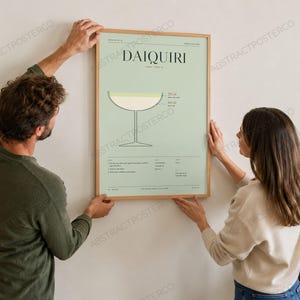 Daiquiri Cocktail Recipe Print in Sage, held up in a room