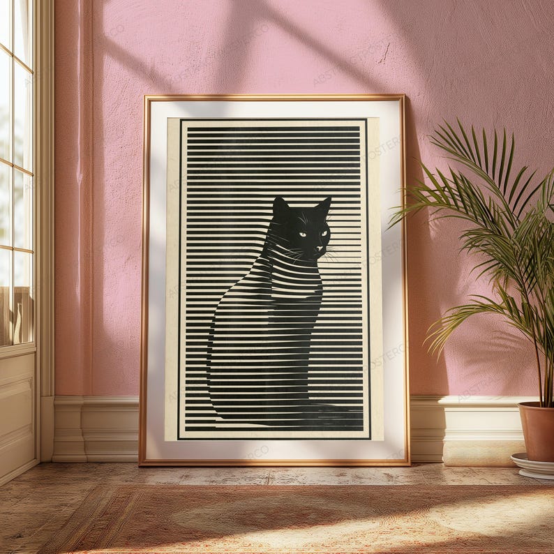 May include: A framed wall art print featuring a black cat silhouette composed of horizontal black and cream-colored stripes. The cat is depicted in a seated profile position against a background of alternating horizontal lines within a rectangular border.