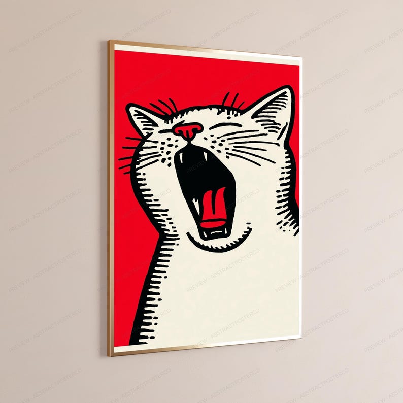 May include: A framed wall art print featuring a graphic illustration of a white cat with black line details, shown yawning with its mouth wide open, set against a solid, vibrant red background. The cat has a small red nose and a red tongue.