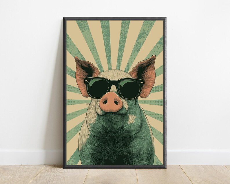 May include: A framed wall art print featuring a stylised illustration of a pig wearing black sunglasses. The pig is centred against a background of radiating light green and beige sunburst rays with a subtle dotted texture throughout the design.