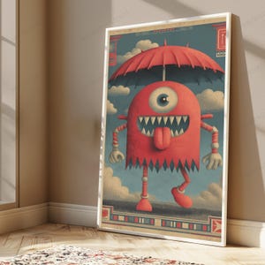 May include: A framed vertical poster featuring a red, one-eyed monster with sharp teeth and a protruding tongue. The creature holds a large red umbrella against a blue sky with white clouds. The artwork includes geometric borders and red accents.
