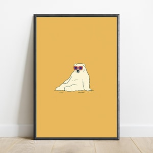 May include: A framed wall art print featuring a white polar bear sitting down against a solid mustard yellow background. The polar bear is wearing red-rimmed sunglasses with dark lenses. The illustration uses clean black outlines for the bear.