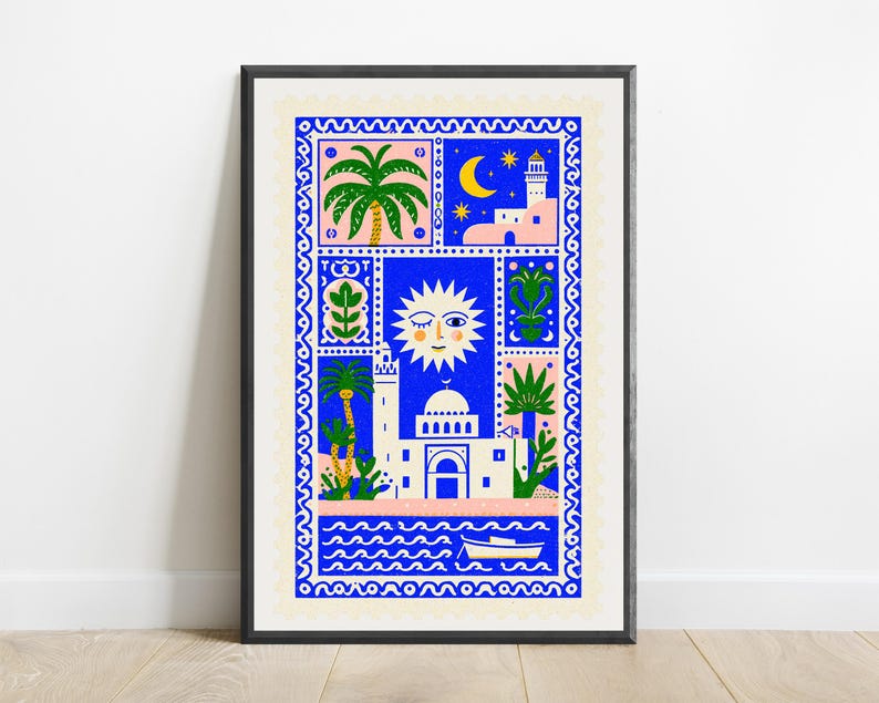 May include: A framed rectangular art print featuring a vibrant blue border with a wavy pattern. The illustration depicts a central sun with a face, a white building with a dome, palm trees, a small boat on water, and a crescent moon with stars.