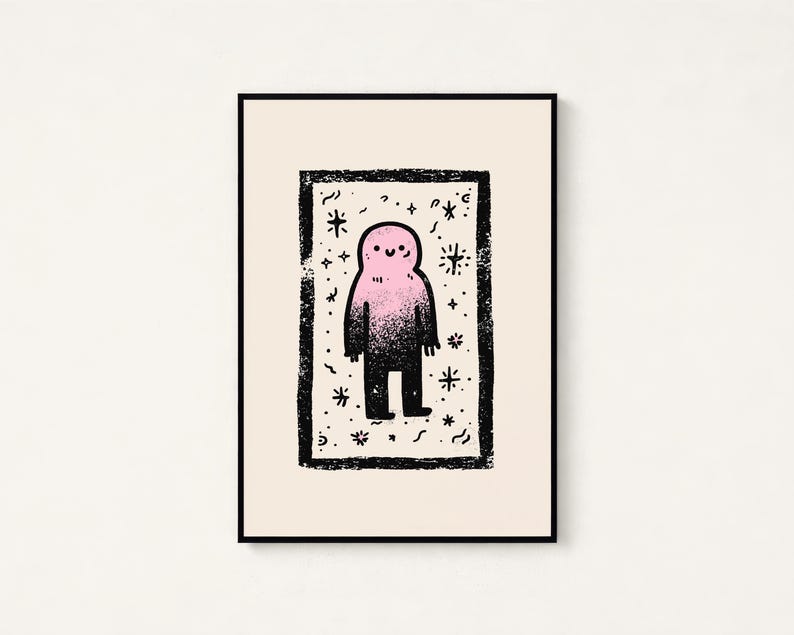 May include: A framed rectangular art print featuring a central figure with a pink head and torso that fades into a black lower body. The figure is enclosed in a thick, textured black border surrounded by small black stars and squiggly line accents.