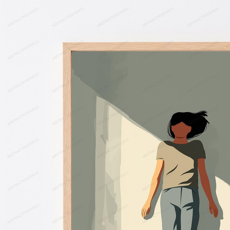 May include: A framed wall art print featuring a stylized illustration of a person with dark hair, wearing a beige t-shirt and gray pants. The figure stands against a muted green and cream background with sharp geometric shadows cast across the scene.