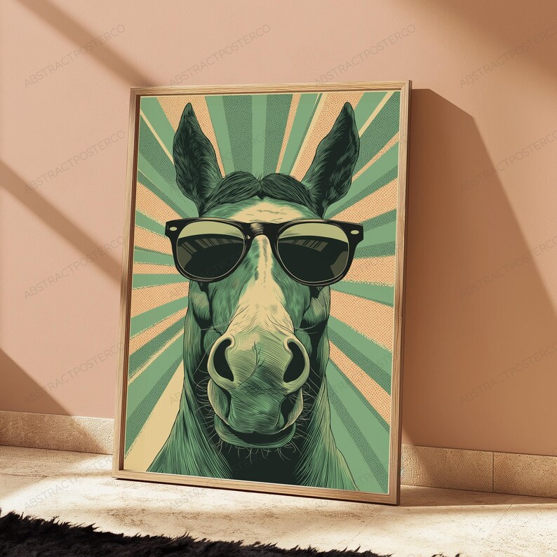 May include: A framed wall art print featuring a stylized illustration of a horse wearing black sunglasses. The horse is centered against a background of radiating green and beige sunburst lines with a vintage-style dotted texture throughout.