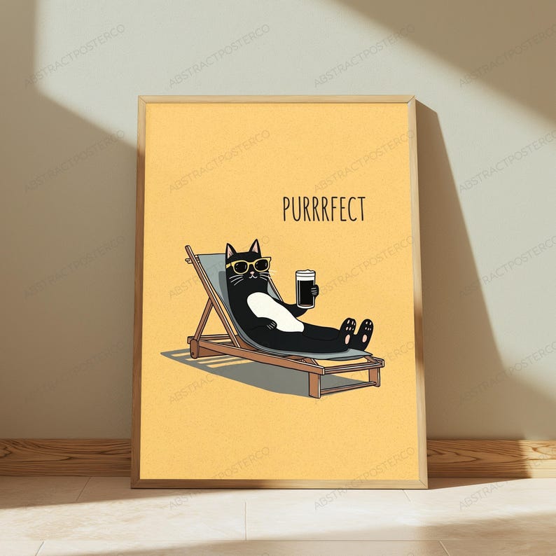 May include: A framed wall art print featuring a black and white cat wearing yellow sunglasses, reclining on a wooden lounge chair while holding a dark beverage. The background is a solid yellow color with the text PURRRFECT printed above the cat.