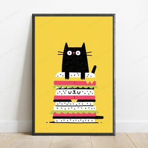 May include: A framed wall art print featuring a black cat with wide eyes sitting atop a tall, multi-layered sandwich. The sandwich consists of white bun layers with black sesame seeds, pink meat slices, and green lettuce, all set against a bright yellow background.