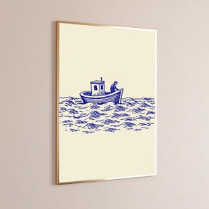 May include: A framed wall art print featuring a dark blue line drawing of a small boat with a cabin and a single figure on board, navigating through stylised, wavy water against a solid, light cream-coloured background.