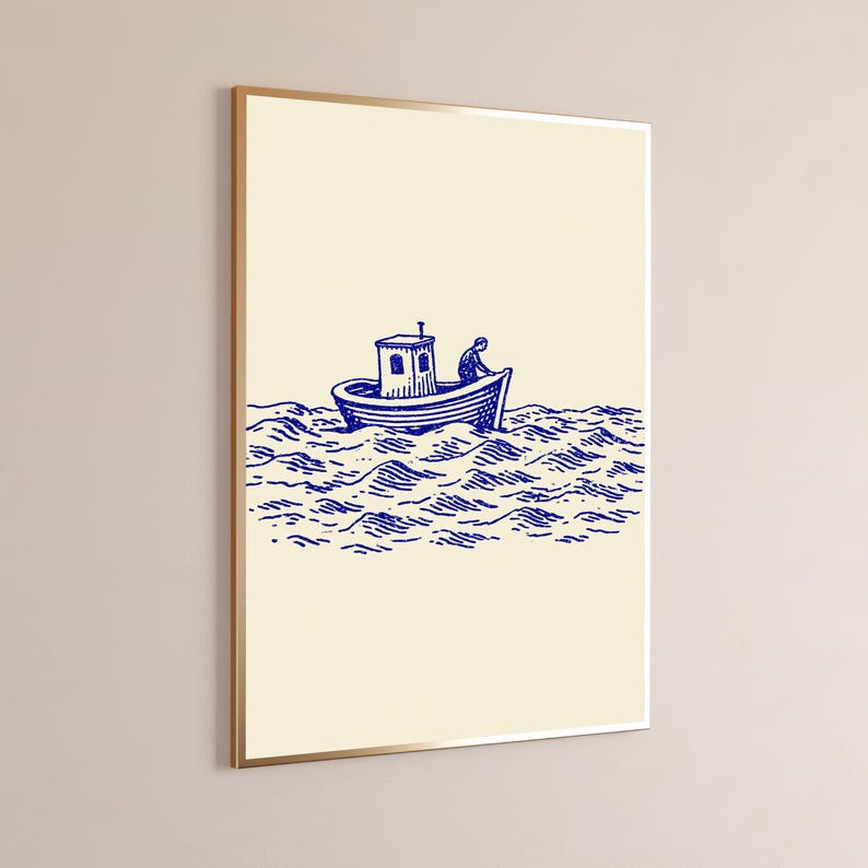 May include: A framed wall art print featuring a dark blue line drawing of a small boat with a cabin and a single figure on board, navigating through stylised, wavy water against a solid, light cream-coloured background.