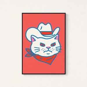 May include: A framed wall art print featuring a stylized illustration of a white cat wearing a white cowboy hat with a red band and a red bandana around its neck, set against a solid coral-red background with bold blue outlines.