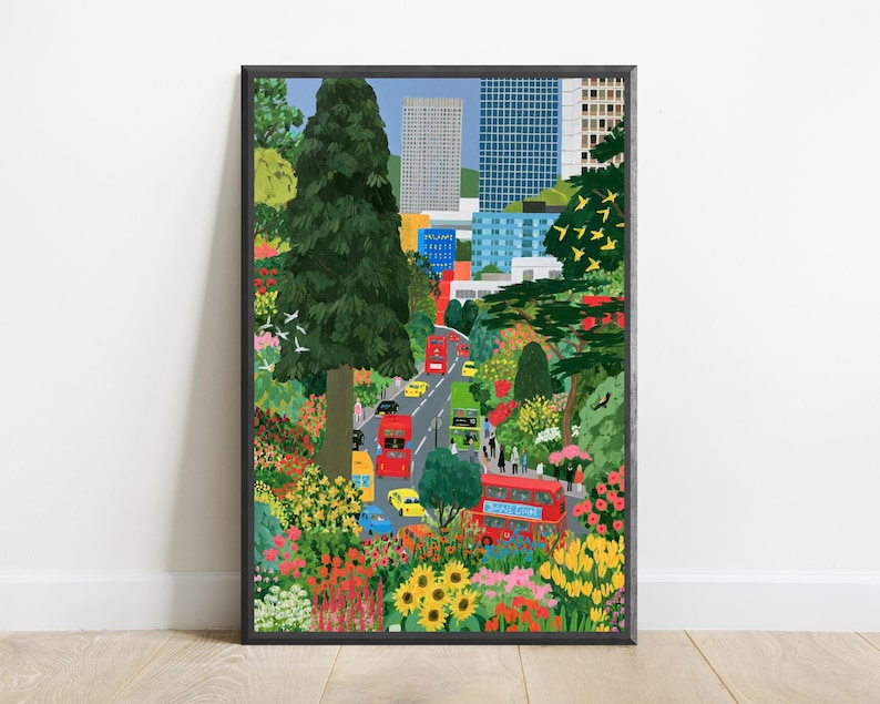 May include: A vertical art print depicting a city street scene framed by lush green trees and vibrant flower beds. Red double-decker buses, yellow taxis, and blue cars travel along the road. Tall modern skyscrapers rise in the background.