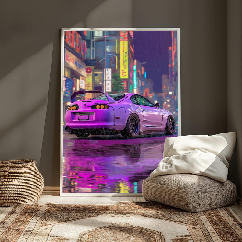 May include: A framed wall art print featuring a purple sports car parked on a wet city street at night. The scene is illuminated by vibrant neon signs in the background, with the car's reflection clearly visible on the rain-slicked pavement.