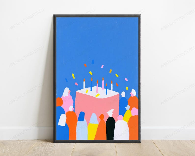 May include: A framed art print featuring a vibrant blue background with a large pink birthday cake in the center. The cake is topped with five lit candles and surrounded by a crowd of stylized figures in colorful clothing with confetti falling.