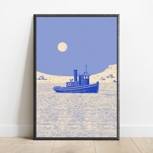 May include: A framed art print featuring a blue tugboat centered on a textured, light-colored sea. The background shows a pale blue sky with a round, cream-colored moon and a distant, barren shoreline with small structures under a soft light.