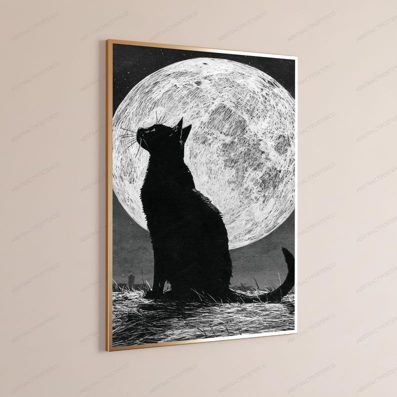 May include: A rectangular wall art print in a thin gold frame featuring a black silhouette of a cat sitting in a field of grass. The cat is looking up toward a large, textured white full moon set against a dark, starry night sky background.