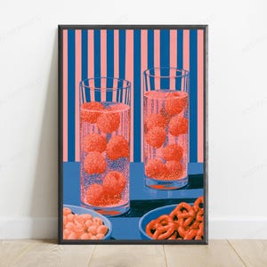 May include: A framed art print featuring two tall glasses filled with a carbonated beverage and red raspberries. Below the glasses are two blue bowls, one containing small round snacks and the other containing twisted pretzels, set against a striped background.
