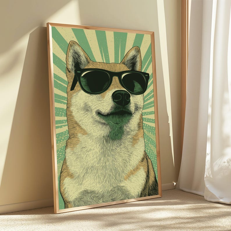 May include: A framed wall art print featuring a detailed illustration of a Shiba Inu dog wearing black sunglasses. The dog is centred against a background of radiating light green and cream-coloured sunburst lines, creating a graphic visual effect.
