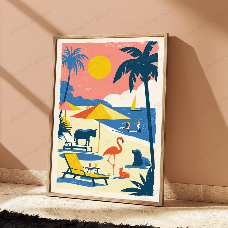 May include: A framed art print featuring a beach scene with a yellow sun, palm trees, a sailboat, and various animals including a flamingo, a donkey, a cat, and a sea lion. The illustration uses a palette of pink, yellow, blue, and cream colors.