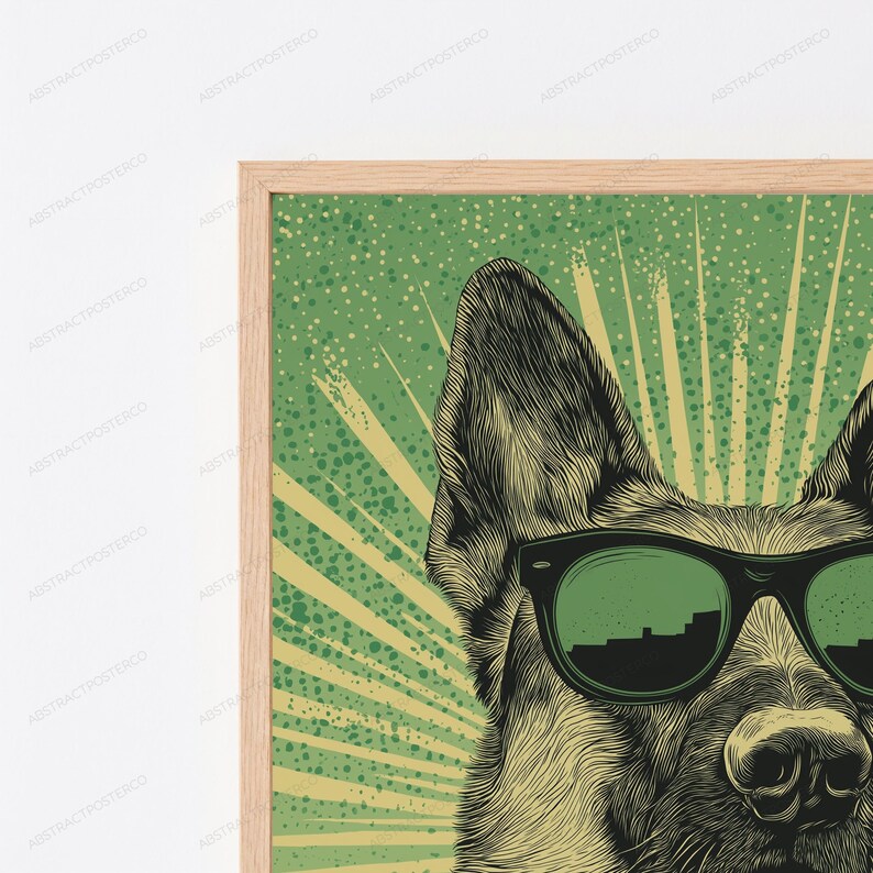 May include: A framed wall art print featuring a detailed black and white illustration of a German Shepherd dog wearing dark green sunglasses. The background is a vibrant green with a radiating sunburst pattern and a speckled texture effect.