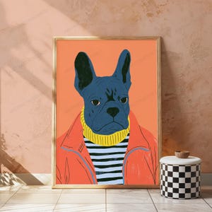 May include: A framed wall art print featuring a dark blue French Bulldog wearing a yellow turtleneck sweater under a bright orange jacket. The dog is depicted against a solid orange background, with a stylized, graphic illustration style.