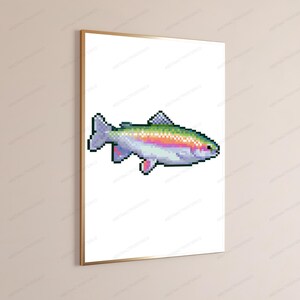May include: A framed wall art print featuring a pixel art illustration of a rainbow trout. The fish is rendered in a digital style with a white background, showcasing a gradient of colors along its side, including pink, green, and blue.
