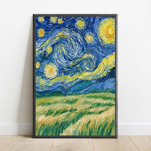 May include: A framed vertical art print featuring a swirling night sky with a large yellow moon and glowing stars above a landscape of rolling green and yellow fields, dark blue mountains, and a single small tree under a dark blue sky.