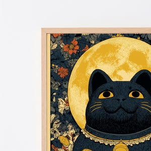 May include: A framed wall art print featuring a black cat with large yellow eyes centered in front of a large yellow moon. The background is filled with a dense pattern of dark blue and orange flowers and leaves. The frame is a light wood color.