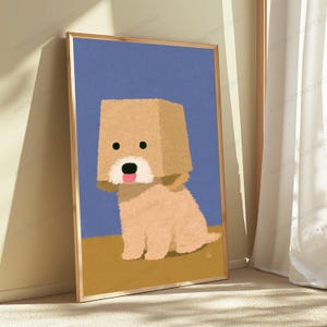May include: A framed digital illustration of a light brown, fluffy dog with a square-shaped head, black eyes, and a pink tongue sticking out. The dog is positioned against a solid blue background above a flat, mustard-yellow ground surface.