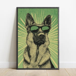 K&ouml;nnte beinhalten: Ein gerahmter Wandkunstdruck mit einer detaillierten Illustration eines Deutschen Sch&auml;ferhundes, der eine schwarze Sonnenbrille tr&auml;gt. Der Hund ist vor einem gr&uuml;nen Hintergrund mit einem strahlenf&ouml;rmigen Muster in Gelbgr&uuml;n zentriert.