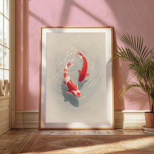 May include: A framed vertical wall art print featuring two koi fish swimming in a circular motion within light gray water. One fish is solid red, while the other is white with red patches. The artwork is displayed in a thin gold frame.