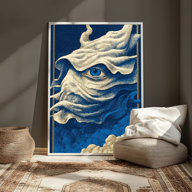 May include: A rectangular wall art print featuring a stylized, flowing cream-colored fabric form with a single, detailed blue eye at its center. The background is a deep navy blue with textured, cloud-like patterns in blue and cream tones.