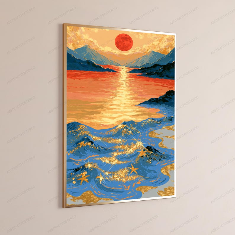 May include: A vertical wall art print featuring a landscape with a large red sun setting over blue mountains and a calm orange sea. The foreground shows blue ocean waves decorated with gold glitter accents and small gold starfish shapes.