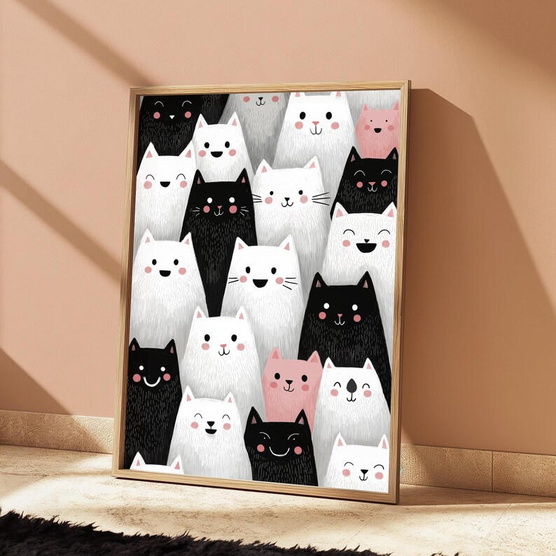 K&ouml;nnte beinhalten: Ein rechteckiger Wandkunstdruck in einem hellen Holzrahmen mit einem sich wiederholenden Muster aus stilisierten Katzen in Schwarz, Wei&szlig; und zartem Rosa. Die Katzen haben einfache Gesichtsz&uuml;ge, darunter kleine Augen, Nasen und rosa runde Wangen, angeordnet in einer dichten, &uuml;berlappenden Komposition.
