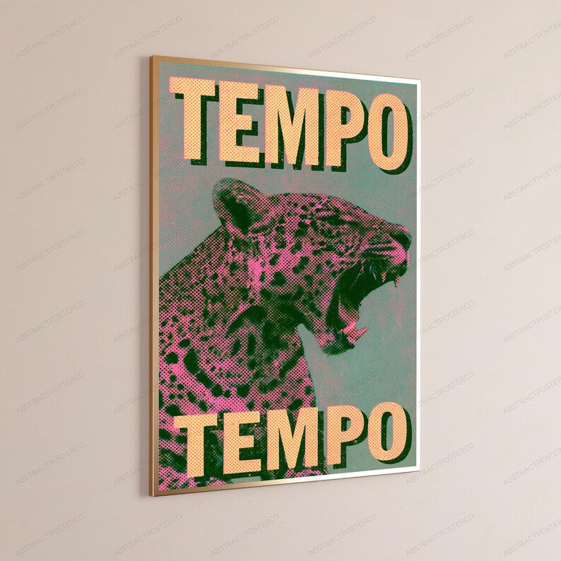 May include: A rectangular wall art print featuring a stylized leopard with its mouth open, rendered in pink and dark green halftone dots against a muted background. The word TEMPO is printed in large, bold, light orange capital letters at the top and bottom.