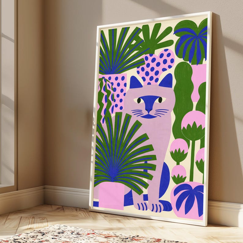 May include: A framed vertical art print featuring a light purple cat centered among various potted plants. The plants have green, blue, and pink foliage in pots with pink and blue patterns. The background is a solid cream color.