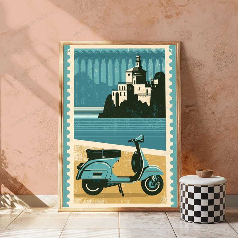May include: A framed poster featuring a vintage-style illustration of a light blue scooter parked on a sandy beach. Above the scooter, a white building sits on a rocky cliff overlooking a blue sea, framed by a decorative postage stamp border.