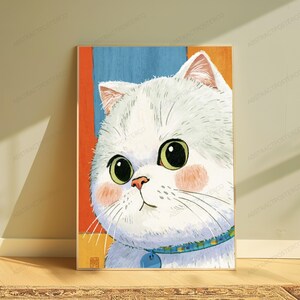 May include: A vertical wall art print featuring a stylized illustration of a white cat with large green eyes and pink cheeks. The cat wears a blue collar with a circular tag. The background consists of vertical blocks of orange and blue colors.