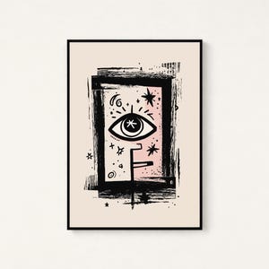 Peut inclure: Une impression d'art murale rectangulaire encadr&eacute;e pr&eacute;sentant une illustration centrale &agrave; l'encre noire d'un &oelig;il entour&eacute; d'&eacute;toiles et de symboles c&eacute;lestes. Le motif est sur un fond rose p&acirc;le doux dans une bordure noire textur&eacute;e et audacieuse.