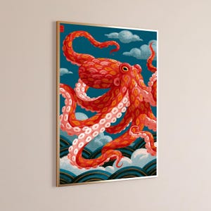 May include: A framed wall art print featuring a vibrant red octopus with detailed suckers on its tentacles, set against a deep teal background with stylised blue waves and light blue clouds. A small red square seal is visible in the top left corner.
