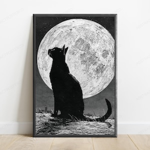 May include: A black and white art print featuring a silhouette of a cat sitting in profile, looking up at a large, textured full moon. The cat is positioned on a grassy surface against a dark night sky, rendered in a detailed, sketch-like style.
